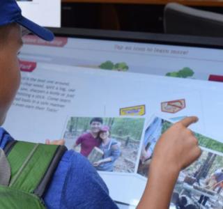 Boy Scouts using kiosk